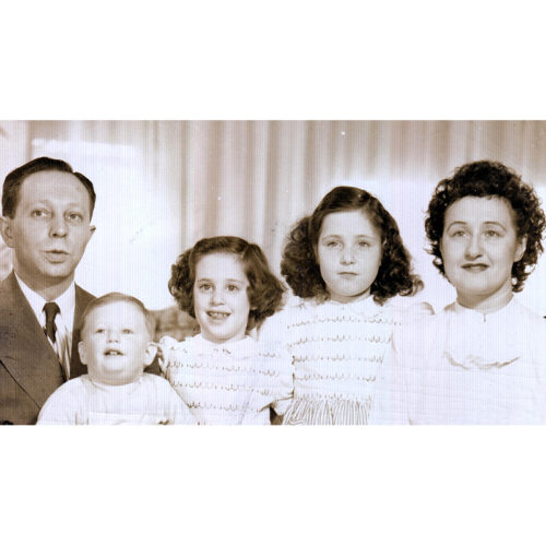With my big sister, Sheila, little brother George and our parents in 1945. (5 years old)